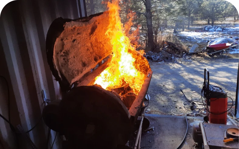 Grill engulfed in flames outdoors
