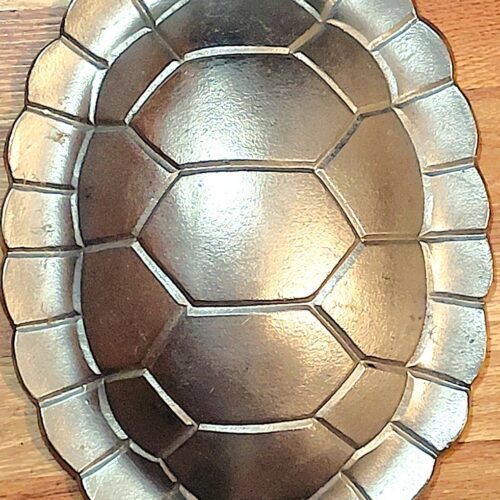 Tortoise-inspired metal serving dish
